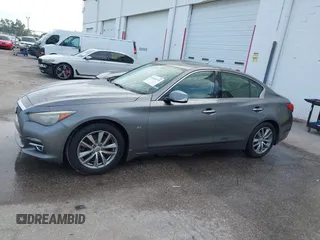 2014 Infiniti Q50 Sport with VIN JN1BV7AR5EM700230, listed as a IAAI auction lot 42445133 with 195,055 mi miles and . Bid and sale history available at DreamBid. Image 14.