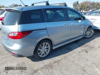 2012 Mazda 5 Grand Touring with VIN JM1CW2DL6C0126640, listed as a IAAI auction lot 42076722 with 124,412 mi miles and . Bid and sale history available at DreamBid. Image 4.