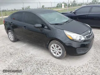 2015 Kia Rio LX with VIN KNADM4A3XF6453521, listed as a IAAI auction lot 42084653 with 94,724 mi miles. Bid and sale history available at carsss.com. Image 1.