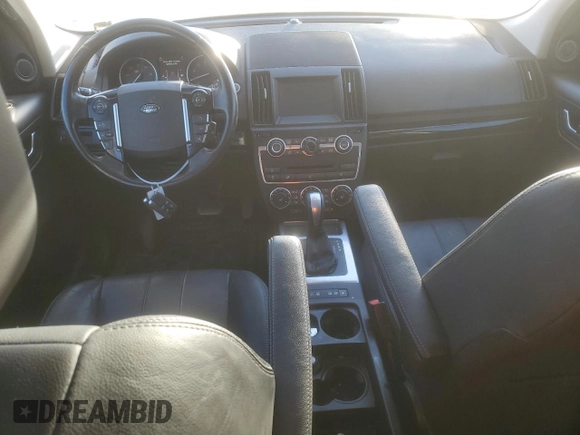 2015 Land Rover LR2 с VIN SALFP2BG2FH425427, выставлен на аукционе Copart как лот 77018534 с пробегом 132 602 миль миль и Списание • Salvage title. История ставок и продаж доступна на DreamBid. Изображение 8.