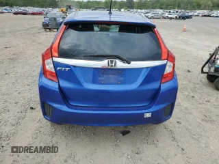 2015 Honda Fit EX-L z VIN 3HGGK5H84FM733529, wystawiony jako Copart lot #53986375 z przebiegiem 102 978 mil mil oraz Czysty tytuł • Clean title. Historia ofert i sprzedaży dostępna na DreamBid. Obrazek 6.