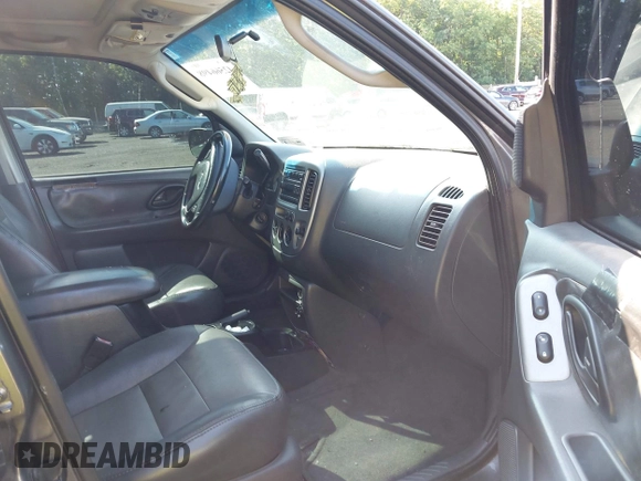 2004 Ford Escape XLT with VIN 1FMCU031X4DA18148, listed as a IAAI auction lot 42566498 with 264,092 mi miles and . Bid and sale history available at DreamBid. Image 5.