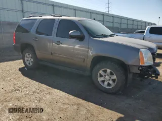 2013 GMC Yukon SLT with VIN 1GKS2CE02DR318091, listed as a Copart auction lot 70860184 with 127,879 mi miles and Salvage Title. Bid and sale history available at carsss.com. Image 4.