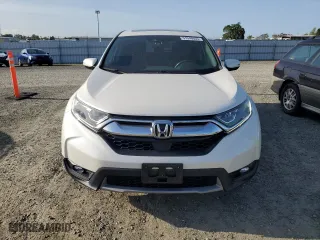 2018 Honda CR-V EX-L with VIN 2HKRW1H80JH516384, listed as a Copart auction lot 51940555 with 57,095 mi miles and Salvage Title. Bid and sale history available at carsss.com. Image 5.