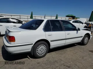 1993 Honda Accord with VIN 1HGCB7653PA144604, listed as a Copart auction lot 60893475 with 149,170 mi miles and Salvage title. Bid and sale history available at DreamBid. Image 3.