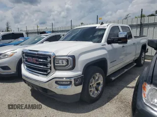 2017 GMC Sierra 1500 SLT z VIN 3GTU2NEJ4HG375889, wystawiony jako Copart lot #59111305 z przebiegiem 71 924 mil mil oraz Czysty tytuł • Clean title. Historia ofert i sprzedaży dostępna na DreamBid. Obrazek 1.