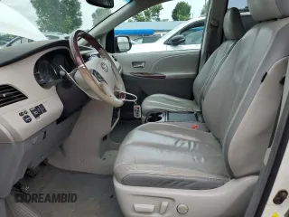 2011 Toyota Sienna XLE AAS with VIN 5TDYK3DC4BS045123, listed as a Copart auction lot 61001785 with 149,260 mi miles and Salvage title. Bid and sale history available at DreamBid. Image 7.