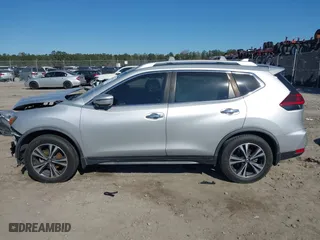 2019 Nissan Rogue SV with VIN JN8AT2MT9KW263300, listed as a IAAI auction lot 41853629 with 104,654 mi miles. Bid and sale history available at carsss.com. Image 14.
