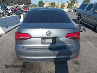 2016 Volkswagen Jetta Sport z VIN 3VWD17AJ0GM386504, wystawiony jako IAAI lot #42000125 z przebiegiem 90 405 mil mil oraz . Historia ofert i sprzedaży dostępna na DreamBid. Obrazek 16.