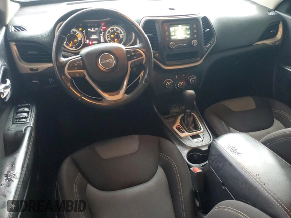 2016 Jeep Cherokee Sport z VIN 1C4PJLAB9GW371386, wystawiony jako Copart lot #57554195 z przebiegiem 158 250 mil mil oraz Szkoda całkowita • Salvage title. Historia ofert i sprzedaży dostępna na DreamBid. Obrazek 8.
