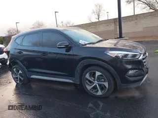 2018 Hyundai Tucson Sport with VIN KM8J33AL4JU753431, listed as a IAAI auction lot 41685678 with 71,934 mi miles. Bid and sale history available at carsss.com. Image 13.