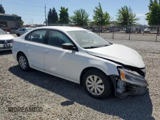 2014 Volkswagen Jetta S with VIN 3VW2K7AJ2EM303673, listed as a Copart auction lot 62909235 with 69,592 mi miles and Salvage title. Bid and sale history available at DreamBid. Image 4.