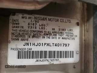 1990 Nissan Maxima z VIN JN1HJ01PXLT401797, wystawiony jako Copart lot #47868945 z przebiegiem Nie podano mil oraz Szkody całkowita. Historia ofert i sprzedaży dostępna na DreamBid. Obrazek 13.