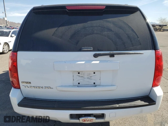2011 GMC Yukon XL SLE with VIN 1GKS1HE08BR208949, listed as a Copart auction lot 75767724 with 164,181 mi miles and Salvage Title. Bid and sale history available at carsss.com. Image 6.