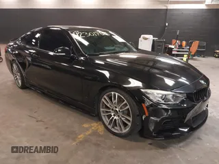 2015 BMW 4 Series 428i with VIN WBA3N3C59FK234025, listed as a IAAI auction lot 42301785 with 66,729 mi miles and . Bid and sale history available at DreamBid. Image 1.