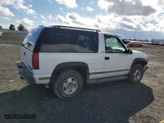 1996 Chevrolet Tahoe with VIN 3GNEK18RXTG149158, listed as a Copart auction lot 48880075 with 157,839 mi miles and Salvage Title. Bid and sale history available at carsss.com. Image 3.