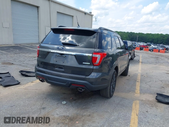 2018 Ford Explorer XLT z VIN 1FM5K7D83JGC51303, wystawiony jako IAAI lot #42456171 z przebiegiem 110 155 mil mil oraz . Historia ofert i sprzedaży dostępna na DreamBid. Obrazek 4.