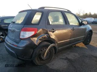 2010 Suzuki SX4 with VIN JS2YB5A31A6300055, listed as a Copart auction lot 82596904 with 80,715 mi miles and Salvage Title. Bid and sale history available at carsss.com. Image 3.