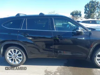 2021 Toyota Highlander Hybrid Limited with VIN 5TDYARAH8MS006883, listed as a IAAI auction lot 41507332 with 169,210 mi miles and . Bid and sale history available at DreamBid. Image 13.