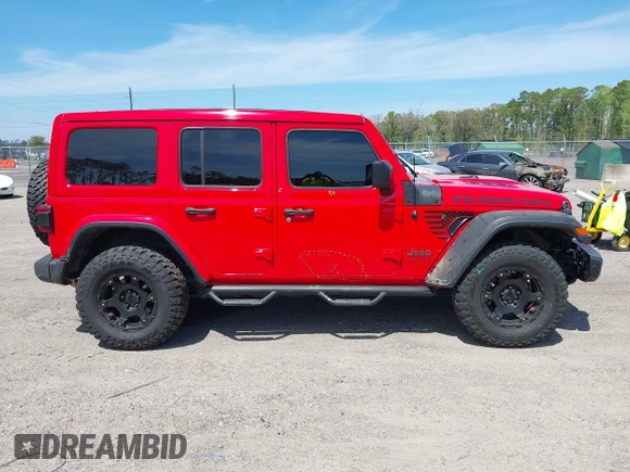 2020 Jeep Wrangler Unlimited Rubicon with VIN 1C4HJXFG9LW106607, listed as a IAAI auction lot 41908295 with 71,083 mi miles and . Bid and sale history available at DreamBid. Image 13.