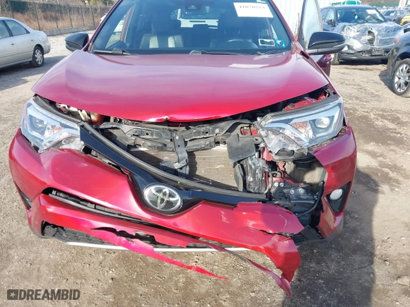 2018 Toyota RAV4 SE with VIN JTMJFREV7JD237235, listed as a IAAI auction lot 41870553 with 116,114 mi miles. Bid and sale history available at carsss.com. Image 6.