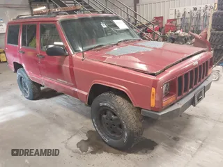 1999 Jeep Cherokee Sport z VIN 1J4FF68S9XL628238, wystawiony jako IAAI lot #42306150 z przebiegiem 143 664 mil mil oraz . Historia ofert i sprzedaży dostępna na DreamBid. Obrazek 1.