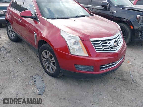 2015 Cadillac SRX z VIN 3GYFNAE3XFS572970, wystawiony jako IAAI lot #40854902 z przebiegiem 124 779 mil mil oraz . Historia ofert i sprzedaży dostępna na DreamBid. Obrazek 1.