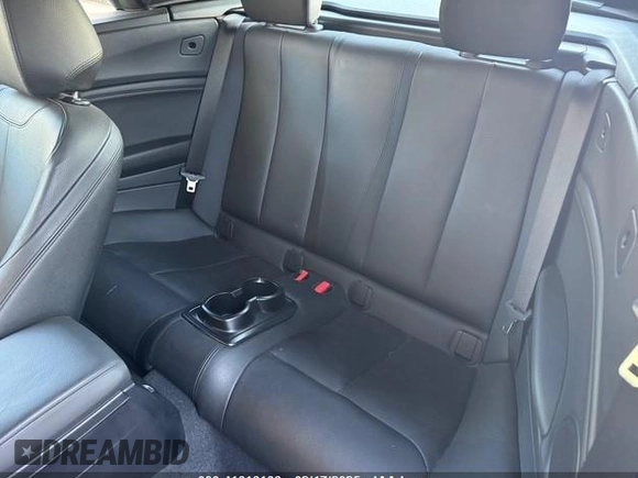 2018 BMW 2 Series 230i xDrive with VIN WBA2K1C55JVB64560, listed as a IAAI auction lot 41616166 with 69,414 mi miles. Bid and sale history available at carsss.com. Image 7.