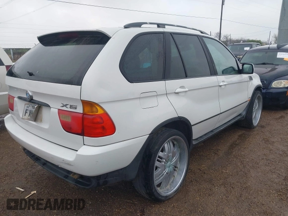 2002 BMW X5 3.0i with VIN 5UXFA53542LV72703, listed as a IAAI auction lot 41636879 with 1 mi miles. Bid and sale history available at carsss.com. Image 4.
