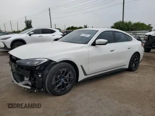 2023 BMW i4 eDrive40 with VIN WBY73AW0XPFN60228, listed as a Copart auction lot 61875624 with 21,597 mi miles and Salvage Title. Bid and sale history available at carsss.com. Image 1.