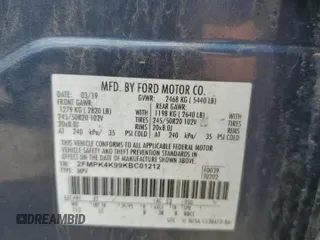 2019 Ford Edge Titanium with VIN 2FMPK4K99KBC01212, listed as a Copart auction lot 57450365 with 52,720 mi miles and Salvage title. Bid and sale history available at DreamBid. Image 13.
