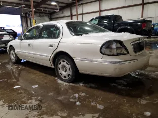 2002 Lincoln Continental with VIN 1LNHM97V82Y679836, listed as a Copart auction lot 89309585 with 96,773 mi miles and Salvage Title. Bid and sale history available at carsss.com. Image 2.