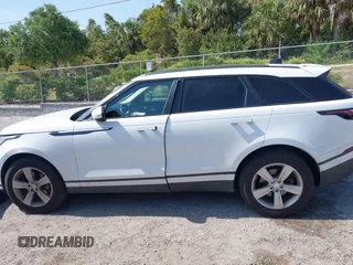 2020 Land Rover Range Rover Velar S z VIN SALYB2EX7LA252141, wystawiony jako IAAI lot #42131779 z przebiegiem 101 612 mil mil oraz . Historia ofert i sprzedaży dostępna na DreamBid. Obrazek 14.