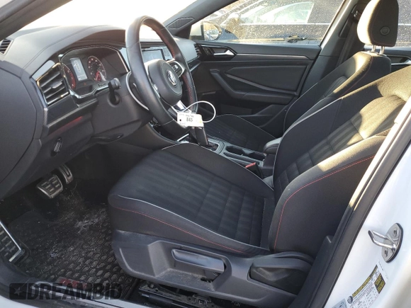 2019 Volkswagen Jetta GLI S z VIN 3VW6T7BU4KM184379, wystawiony jako Copart lot #43369475 z przebiegiem 83 476 mil mil oraz Szkoda całkowita • Salvage title. Historia ofert i sprzedaży dostępna na DreamBid. Obrazek 7.