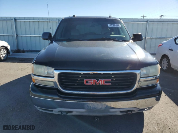 2004 GMC Yukon SLT with VIN 1GKEK13Z34R106142, listed as a Copart auction lot 77596684 with 209,198 mi miles and Clean Title. Bid and sale history available at carsss.com. Image 5.