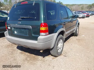 2001 Ford Escape XLT with VIN 1FMCU03121KF56950, listed as a IAAI auction lot 41768628 with 265,069 mi miles. Bid and sale history available at carsss.com. Image 4.