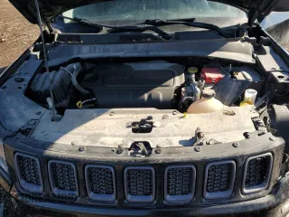 2019 Jeep Compass Trailhawk with VIN 3C4NJDDB1KT727756, listed as a Copart auction lot 42439055 with 104,525 mi miles and Salvage Title. Bid and sale history available at carsss.com. Image 12.