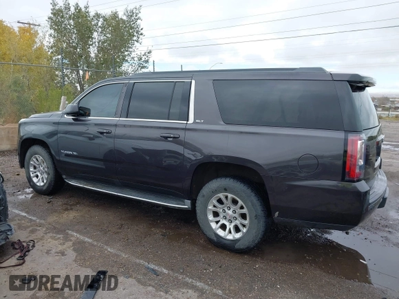 2015 GMC Yukon XL SLT with VIN 1GKS1HKC8FR219289, listed as a IAAI auction lot 40772496 with 163,477 mi miles. Bid and sale history available at carsss.com. Image 14.