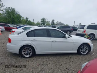 2010 BMW 3 Series 328i with VIN WBAPH7G59ANM52662, listed as a IAAI auction lot 42170338 with 163,648 mi miles and . Bid and sale history available at carsss.com. Image 13.
