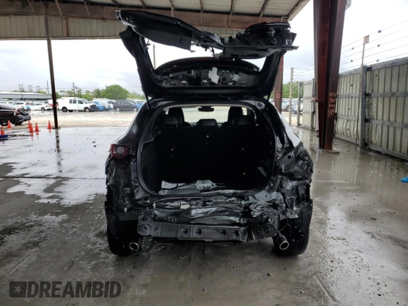 2023 Mazda CX-30 S Carbon Edition with VIN 3MVDMBCM9PM506691, listed as a Copart auction lot 55864895 with 21,441 mi miles and Salvage title. Bid and sale history available at DreamBid. Image 6.