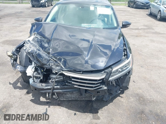2017 Volkswagen Passat SE with VIN 1VWGT7A32HC034410, listed as a IAAI auction lot 42470146 with 96,226 mi miles and . Bid and sale history available at DreamBid. Image 6.