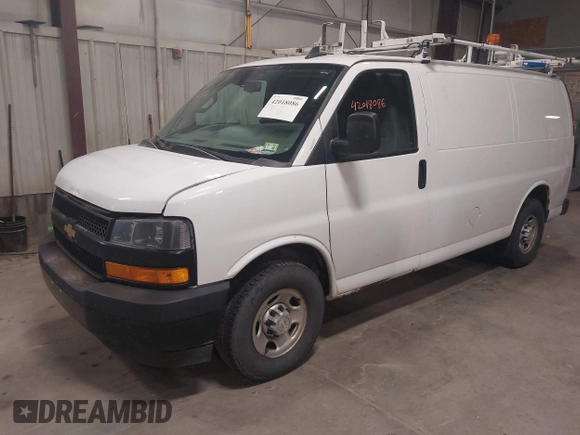 2018 Chevrolet Express Cargo with VIN 1GCWGAFP4J1342434, listed as a IAAI auction lot 42018086 with 149,934 mi miles and . Bid and sale history available at DreamBid. Image 2.