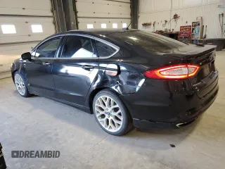 2014 Ford Fusion Titanium with VIN 3FA6P0K94ER231241, listed as a Copart auction lot 47886135 with 70,925 mi miles and Salvage Title. Bid and sale history available at DreamBid. Image 2.