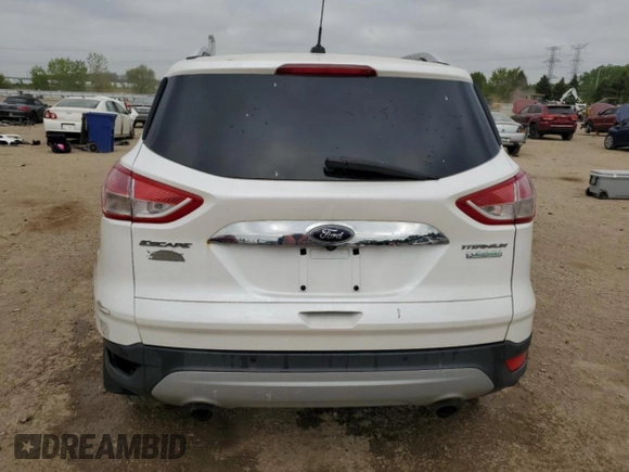 2014 Ford Escape Titanium с VIN 1FMCU0J93EUC35437, выставлен на аукционе Copart как лот 56299395 с пробегом 130 770 миль миль и Списание • Salvage title. История ставок и продаж доступна на DreamBid. Изображение 6.