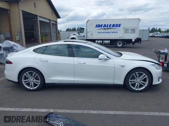 2016 Tesla Model S 90D with VIN 5YJSA1E21GF121962, listed as a IAAI auction lot 42130291 with 114,670 mi miles and . Bid and sale history available at DreamBid. Image 14.