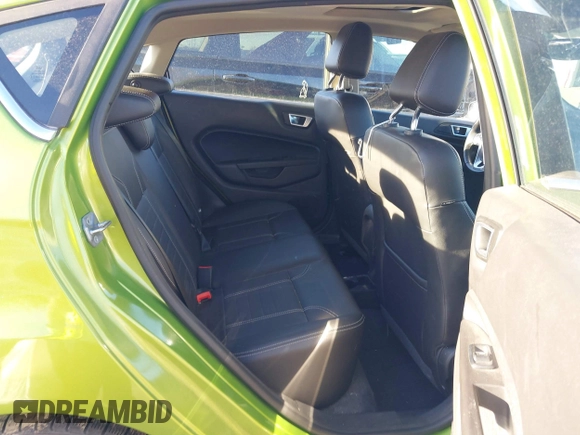 2018 Ford Fiesta Titanium z VIN 3FADP4FJ2JM142861, wystawiony jako IAAI lot #41860660 z przebiegiem 20 820 mil mil oraz . Historia ofert i sprzedaży dostępna na DreamBid. Obrazek 8.