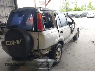1999 Honda CR-V LX with VIN JHLRD2845XC018679, listed as a IAAI auction lot 39900180 with 222,656 mi miles. Bid and sale history available at carsss.com. Image 14.
