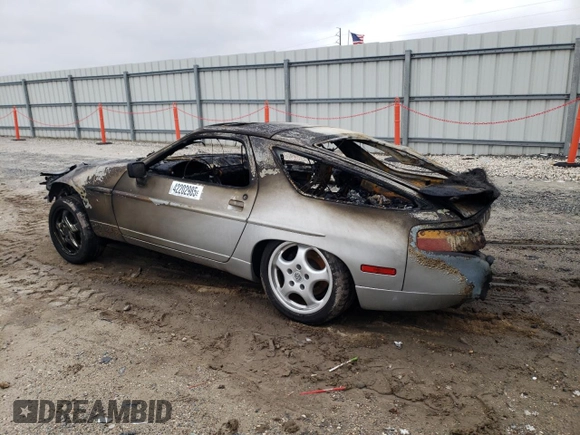 1987 Porsche 928 z VIN WP0JB0924HS862026, wystawiony jako Copart lot #42202985 z przebiegiem Nie podano mil oraz Nie do naprawy • Non repairable. Historia ofert i sprzedaży dostępna na DreamBid. Obrazek 2.