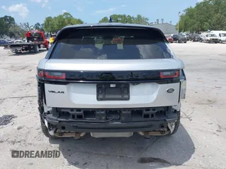 2021 Land Rover Range Rover Velar R-Dynamic S z VIN SALYT2EX9MA315965, wystawiony jako IAAI lot #42344448 z przebiegiem 66 819 mil mil oraz . Historia ofert i sprzedaży dostępna na DreamBid. Obrazek 17.