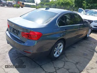 2018 BMW 3 Series 330i xDrive with VIN WBA8D9G54JNU70241, listed as a IAAI auction lot 42226428 with Not provided miles and . Bid and sale history available at DreamBid. Image 4.